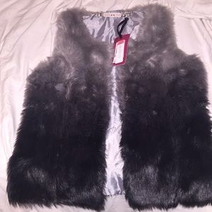 Xs new with tags. Fits as a small also